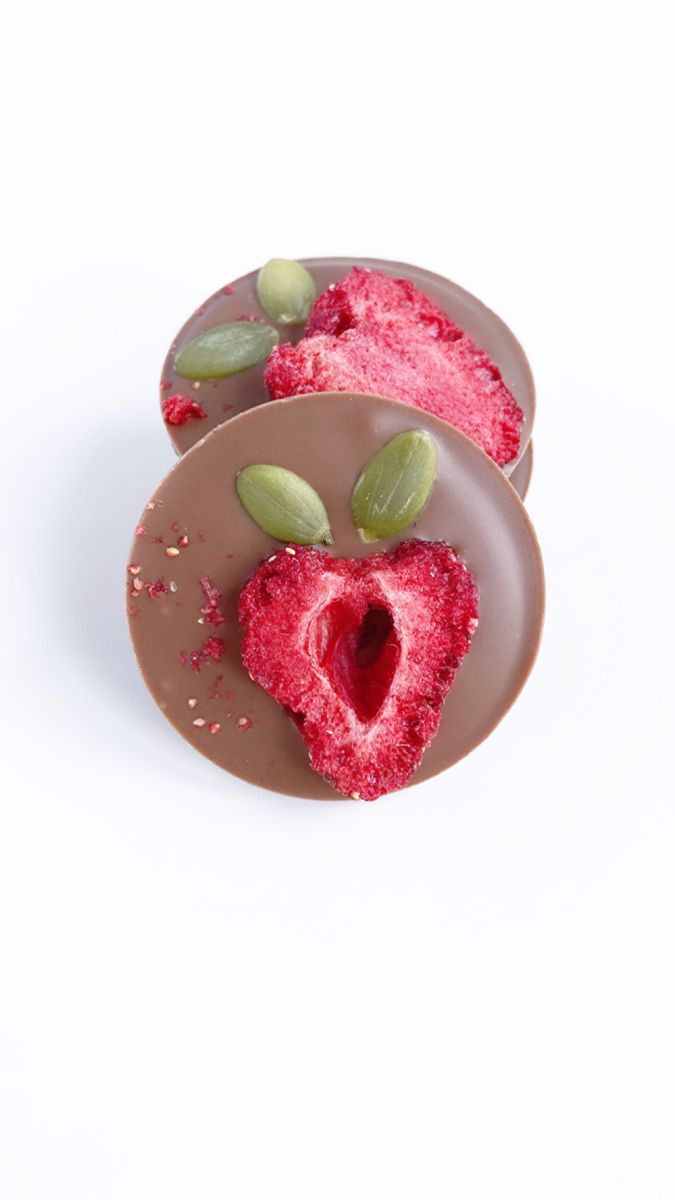 Milk chocolate mendicant with dried strawberry and pumpkin seeds