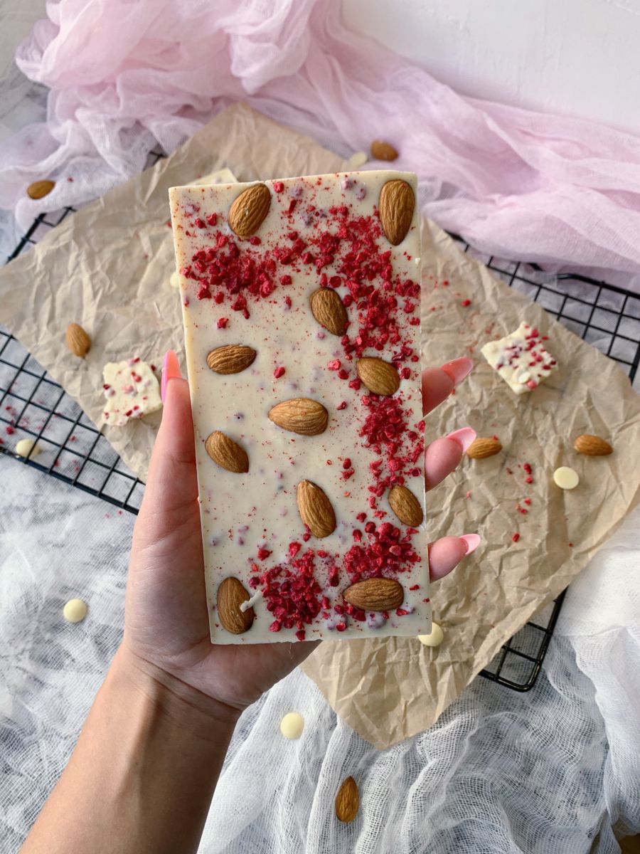 Our exquisite blend combines the smoothness of white chocolate with the crunch of premium almonds and the tartness of dried raspberries.