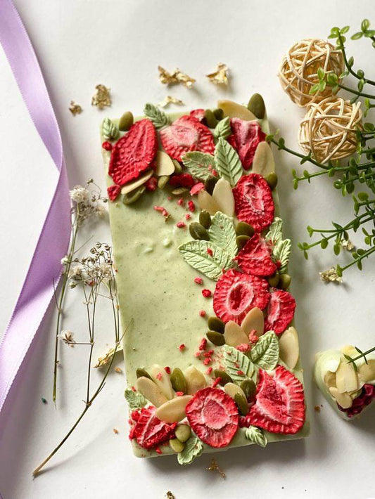 White chocolate with matcha, dried strawberry and nuts